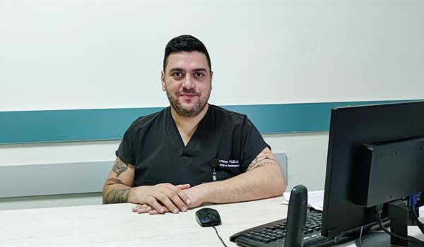 Dr. Hakan Tuzlali
